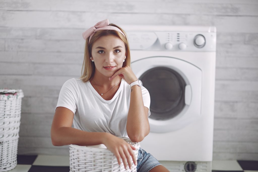 woman-bathroom-near-wash-mashine
