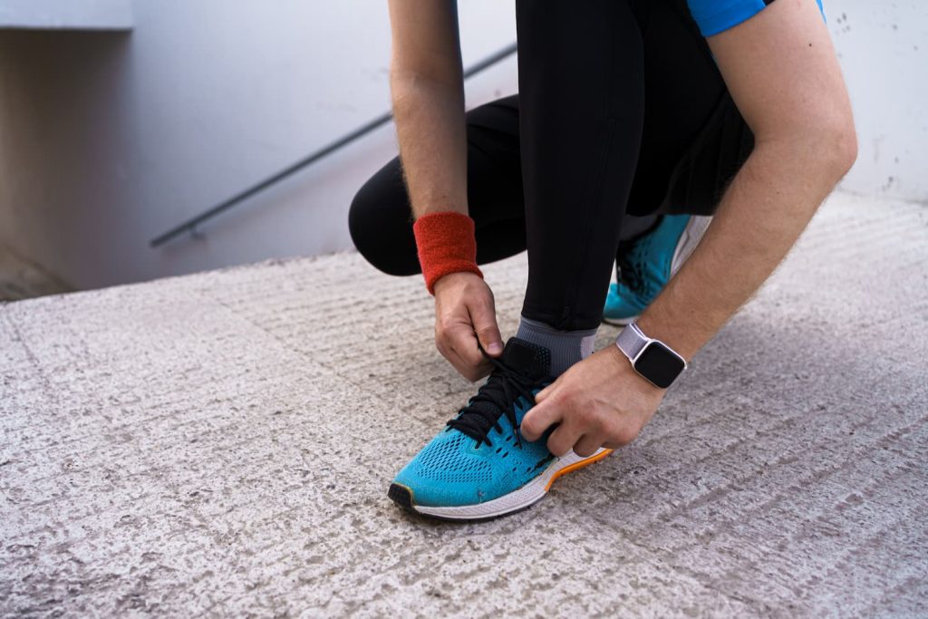 An-athlete-preparing-for-a-Marathon-in-Hokas